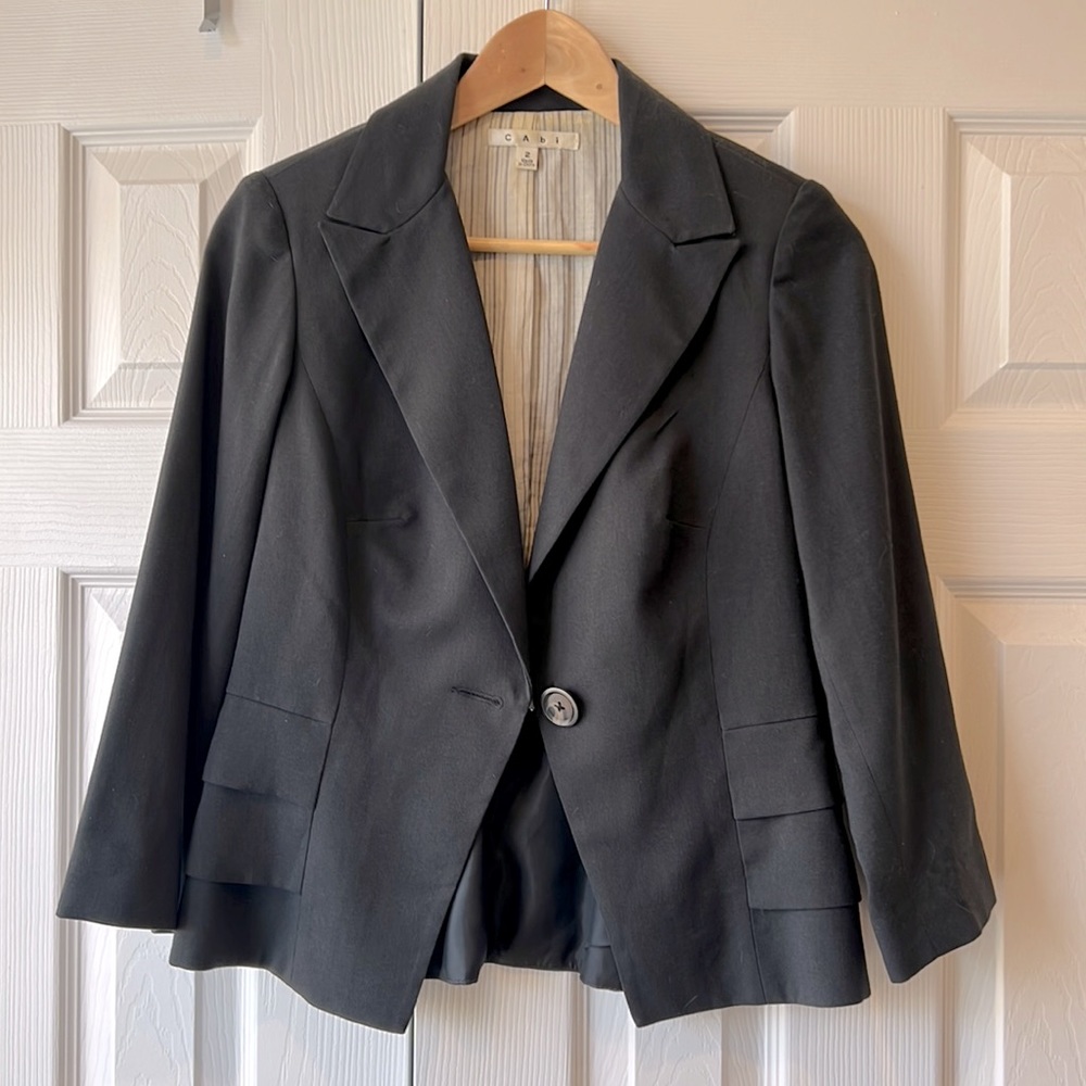 Blue blazer with ruffled back